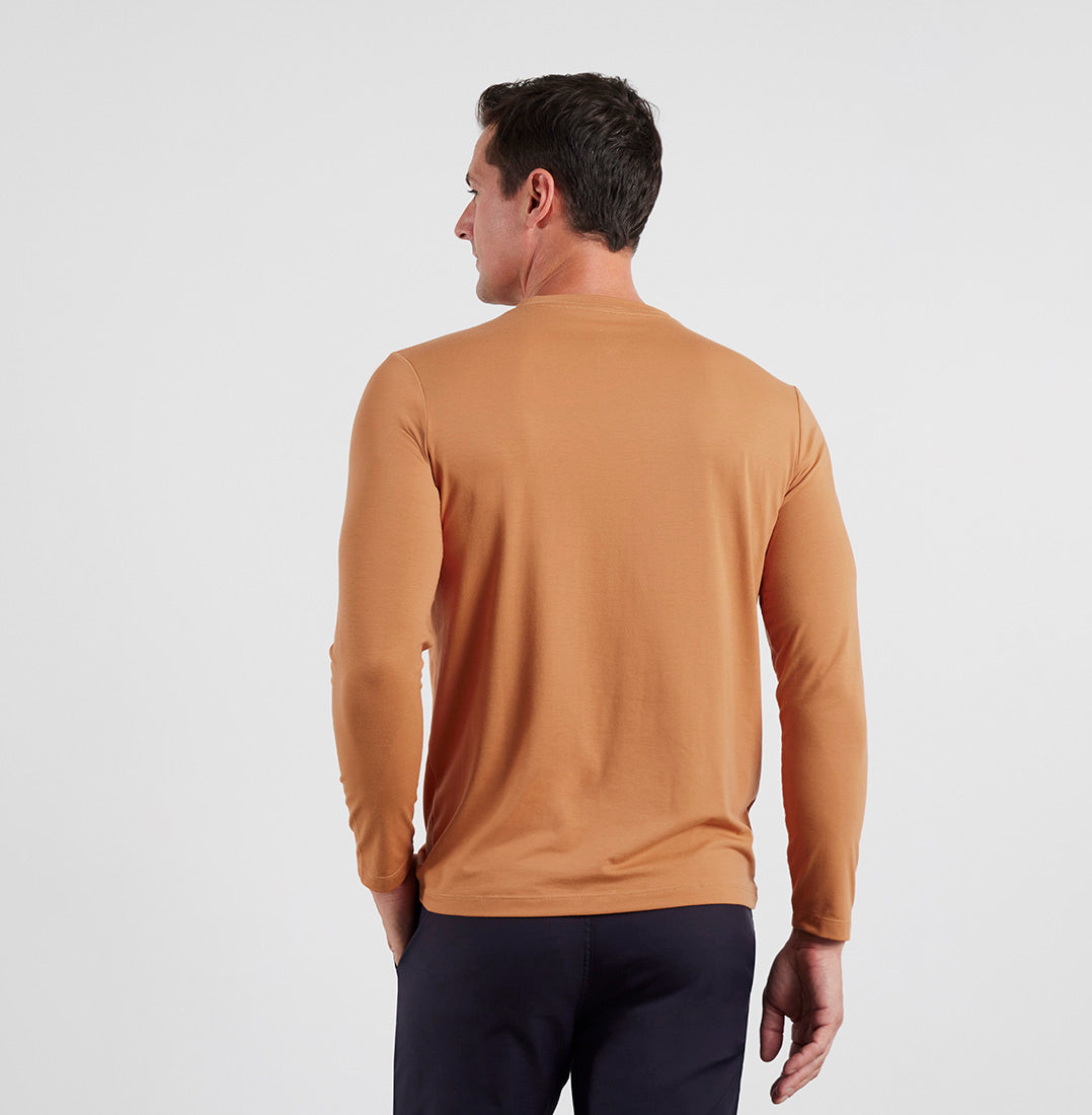 Back view of model wearing Threshold LS Rustic Orange T-shirt