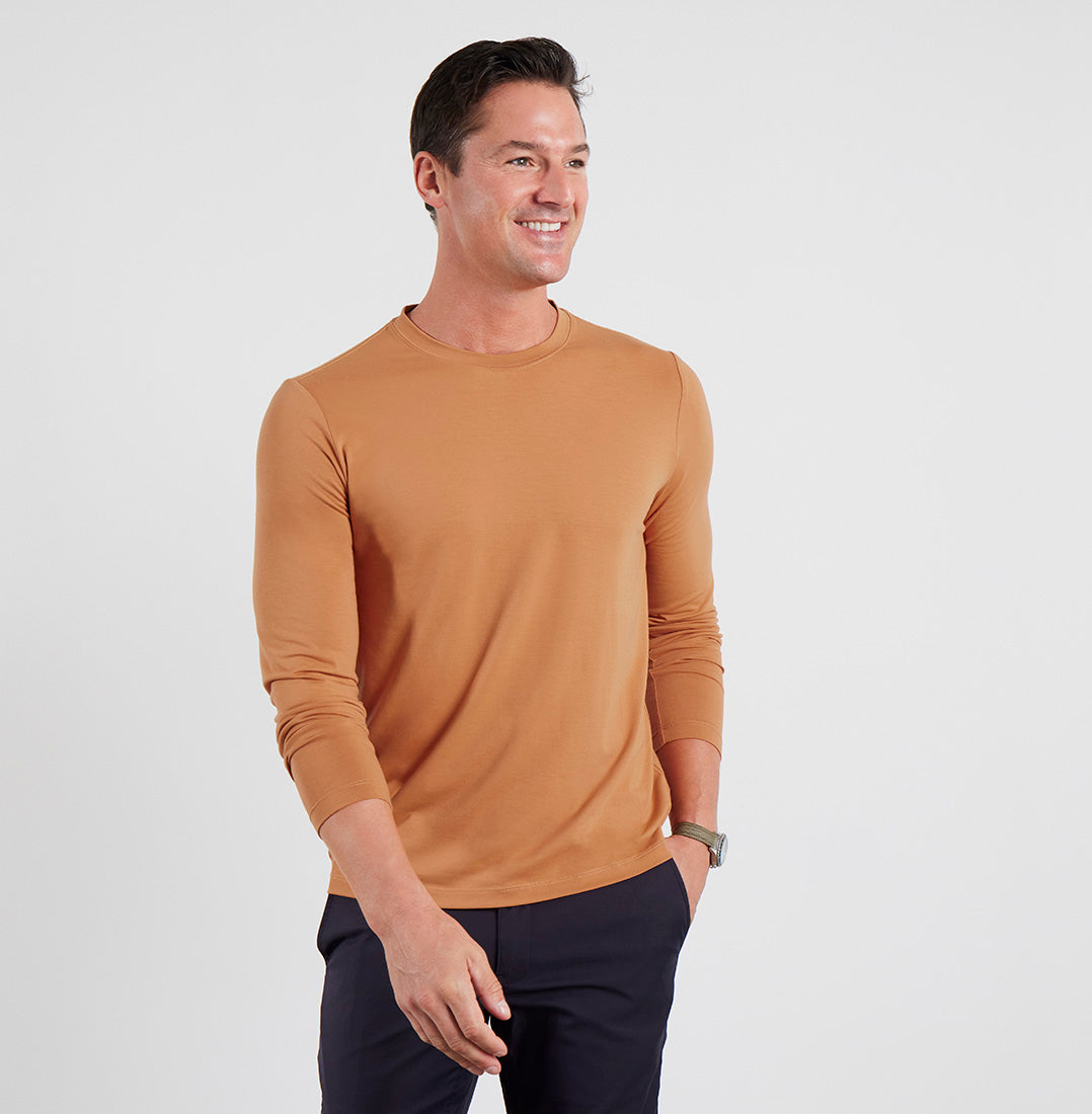 Front view of model wearing Threshold LS Rustic Orange T-shirt